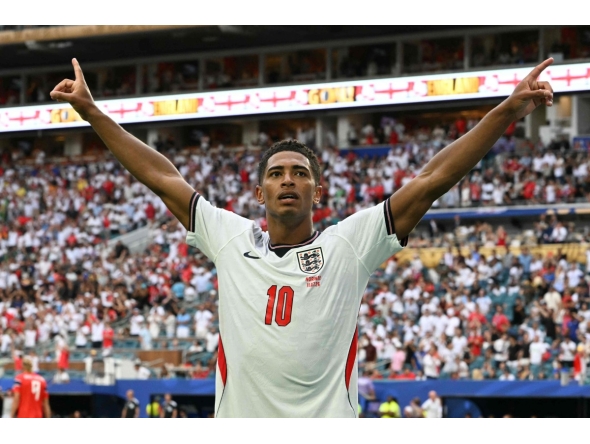 England's midfielder #10 Jude Bellingham celebrates after scoring his team's second goal during the 2026 World Cup football tournament quarter-final match between Norway and England at Miami Stadium in Miami on July 11, 2026. (Photo by ROBERTO SCHMIDT / AFP)