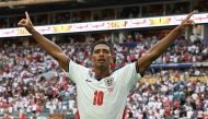 England's midfielder #10 Jude Bellingham celebrates after scoring his team's second goal during the 2026 World Cup football tournament quarter-final match between Norway and England at Miami Stadium in Miami on July 11, 2026. (Photo by ROBERTO SCHMIDT / AFP)