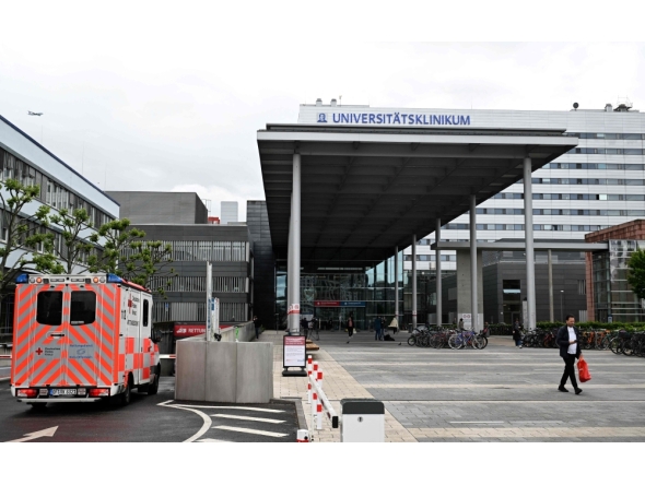(Files) An ambulance car arrives at the university hospital (Universitنtsklinikum Frankfurt) in Frankfurt am Main, western Germany, on May 11, 2026. (Photo by Kirill Kudryavtsev / AFP)