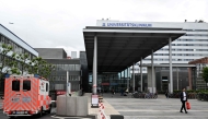 (Files) An ambulance car arrives at the university hospital (Universitنtsklinikum Frankfurt) in Frankfurt am Main, western Germany, on May 11, 2026. (Photo by Kirill Kudryavtsev / AFP)