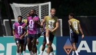 England’s Harry Kane (right) takes part in a training session with teammates. (PICS: AFP)