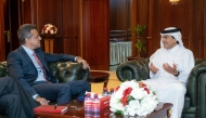CEO of QIIB Dr. Abdulbasit Ahmed Al-Shaibei with Senior Vice President and Group Country Manager for Visa across the UAE, Kuwait, and Qatar Fadi Moukaddem.