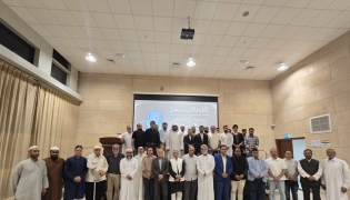 Participants during the condolence meeting at MIE-SPPU Institute of Higher Education (Pune University) located in Doha.