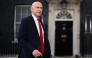 Britain's former Defence secretary John Healey leaves 10 Downing Street in London July 20, 2026 as cabinet appointments are being made after Andy Burnham became Britain's new Prime Minister. (Photo by Henry Nicholls / AFP)