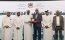 The ministry’s delegation receiving a memento during the event.