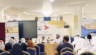 Officials and participants during the seminar.
