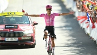 EF Education - EasyPost team's Ecuadorian rider Richard Carapaz cycles to the finish line to win the 18th stage of the 113th edition of the Tour de France cycling race, 185 km between Voiron and Orcières-Merlette in the French Alps, on July 23, 2026. (Photo by Loic VENANCE / AFP)