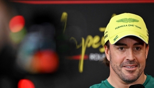 Aston Martin's Spanish driver Fernando Alonso addresses the press conference ahead of the Formula One Hungarian Grand Prix at the Hungaroring circuit in Mogyorod near Budapest, Hungary, on July 23, 2026. (Photo by Attila KISBENEDEK / AFP)