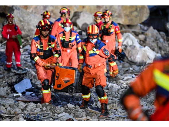 Rescuers work at the site of a landslide in Pengshui Miao and Tujia Autonomous County, southwest China's Chongqing Municipality, July 18, 2026. (Xinhua/Wang Quanchao)