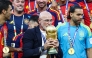 Spain's head coach Luis de la Fuente kisses the trophy after winning the 2026 World Cup football tournament final match between Spain and Argentina at the New York/New Jersey Stadium in East Rutherford on July 19, 2026. (Photo by Franck Fife / AFP)
