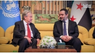 This handout picture taken and released by the official Syrian Arab News Agency (SANA) on July 25, 2026 shows syria's Foreign Affairs Minister Asaad al-Shaibani (R) receiving UN Secretary-General Antonio Guterres (L) at Damascus International Airport in Damascus. (Photo by SANA / AFP)