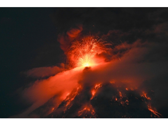 The Fuego volcano erupts 65 kilometers southwest of Guatemala City on August 3, 2026. (Photo by Johan ORDONEZ / AFP)
