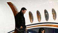 Argentine football star Lionel Messi (L) and his wife Antonela Roccuzzo arrive at the Islas Malvinas International Airport after the death of his father Jorge Messi in Rosario, Santa Fe province, Argentina on August 8, 2026. Photo by LUIS ROBAYO / AFP