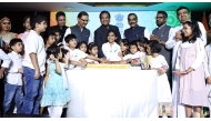 Chargé d’Affaires Sandeep Kumar with members of the Indian community during the cake cutting ceremony. PIC: Rajan Vadakkemiriyil/The Peninsula.