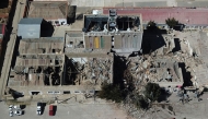 This aerial view show the army barracks after an explosion on the eve, in Viacha, Bolivia, on September 5, 2026. At least two people were killed, 81 injured, and 14 people are still missing after a powerful explosion on September 4, 2026 at a military facility storing pyrotechnic material in Bolivia. The cause of the blast remains under investigation. (Photo by Aizar RALDES / AFP)