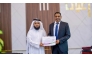 CEO of Thani Humanitarian Dr. Ayed bin Debsan Al Qahtani (left) honouring CEO of Aayan Leasing Company Mohammed Ziada Taha.