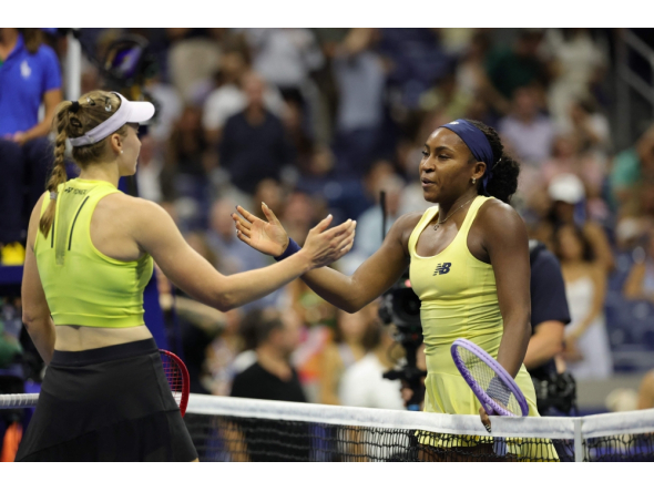 Kazakhstan's Elena Rybakina goes in to hug USA's Coco Gauff after their women's singles semi-final tennis match on day twelve of the US Open tennis tournament at the USTA Billie Jean King National Tennis Center in New York City on September 10, 2026. (Photo by KENA BETANCUR / AFP)