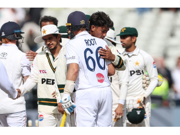 England's Joe Root (C) hugs Pakistan's Razaullah (2nd R) at the end of play on day four of the third Test match between England and Pakistan at Edgbaston cricket ground in Birmingham, central England, on September 12, 2026. (Photo by Darren Staples / AFP)