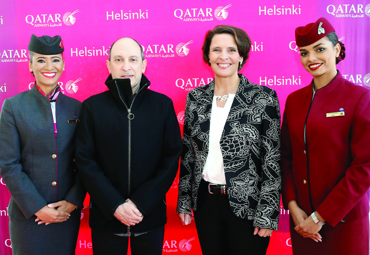 Finland’s Minister of Transport and Communications Anne Berner welcomes Qatar Airways Group Chief Executive Akbar Al Baker at Helsinki airport.