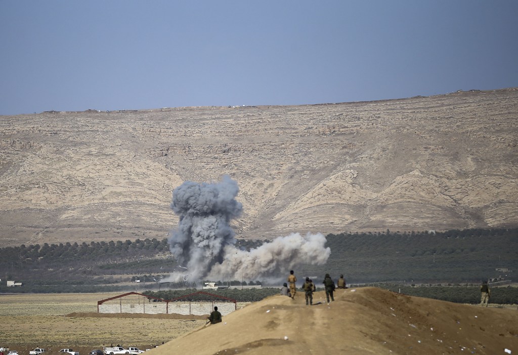 Smoke rises after coalition forces' airstrike over Islamic State targets as Iraqi Kurdish Regional Government's peshmerga forces attack to capture Nawaran Village and the other surrounding villages from IS terrorists during the operation to retake Iraq's 