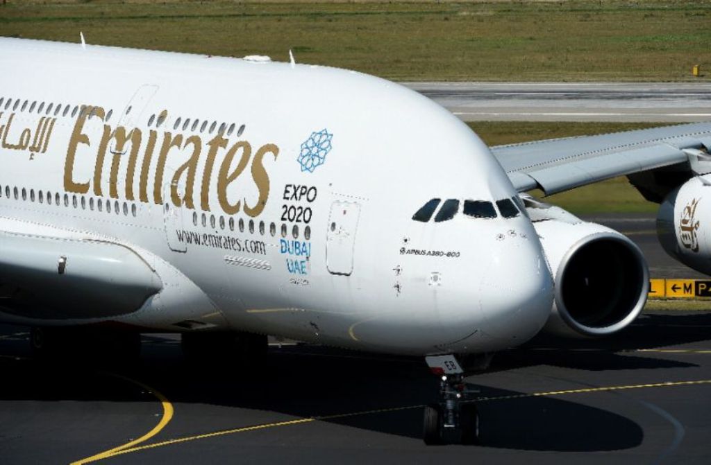 Emirates Airline net profit surges 65% in its first half on lower fuel costs and higher passenger numbers (AFP Photo/Patrik Stollarz)