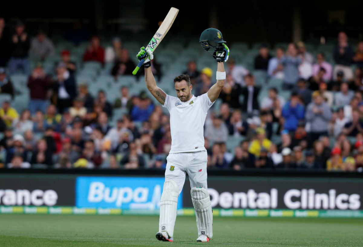 South Africa's captain Faf du Plessis celebrates his century 100 runs during the first day of the Third Test cricket match in Adelaide. (Reuters/Jason Reed)