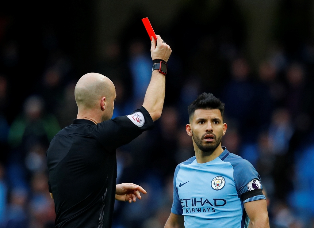Manchester City's Sergio Aguero is shown a red card by referee Anthony Taylor Reuters / Phil Noble 
