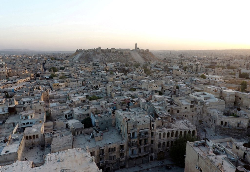 A general view taken with a drone shows the Old City of Aleppo and Aleppo's historic citadel, Syria October 12, 2016. REUTERS/Abdalrhman Ismail/File Photo
