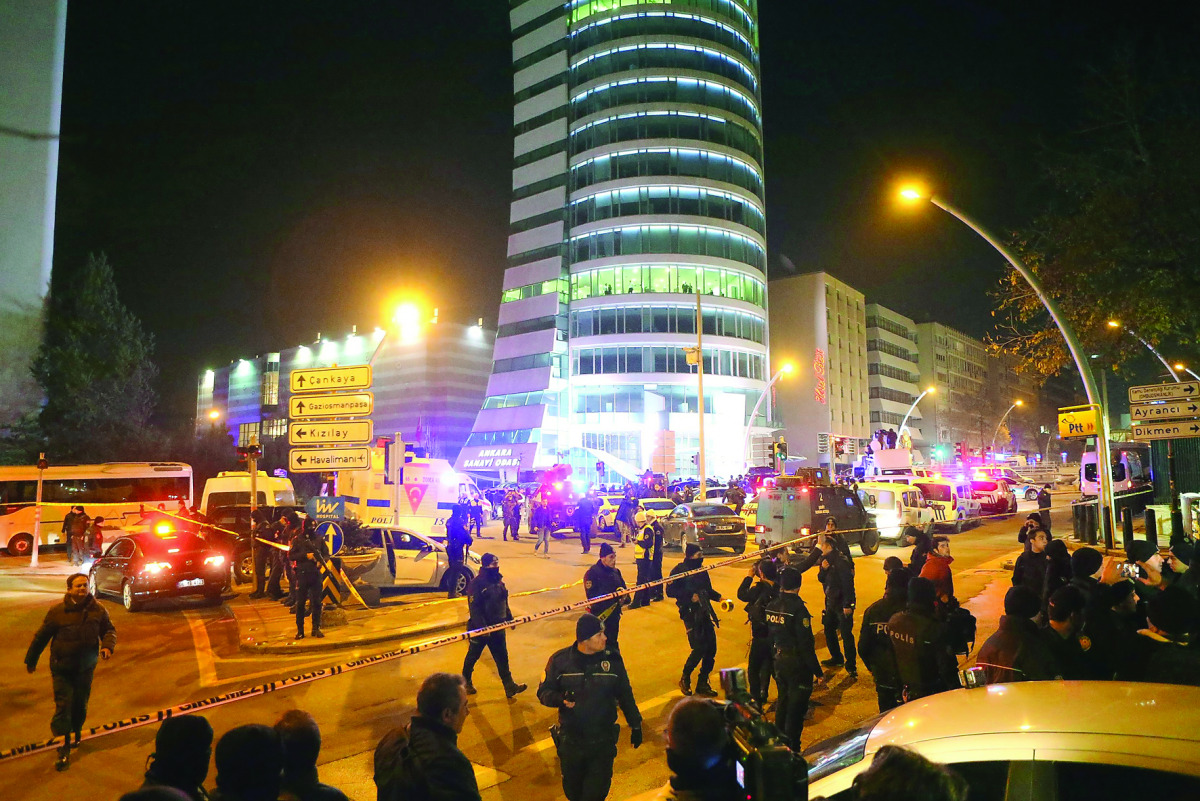 Policemen guarding outside the Cagdas Sanatlar Merkezi, a major art exhibition hall, where Andrey Karlov, the Russian ambassador to Ankara, was shot dead in a gun attack during a public event in Ankara.