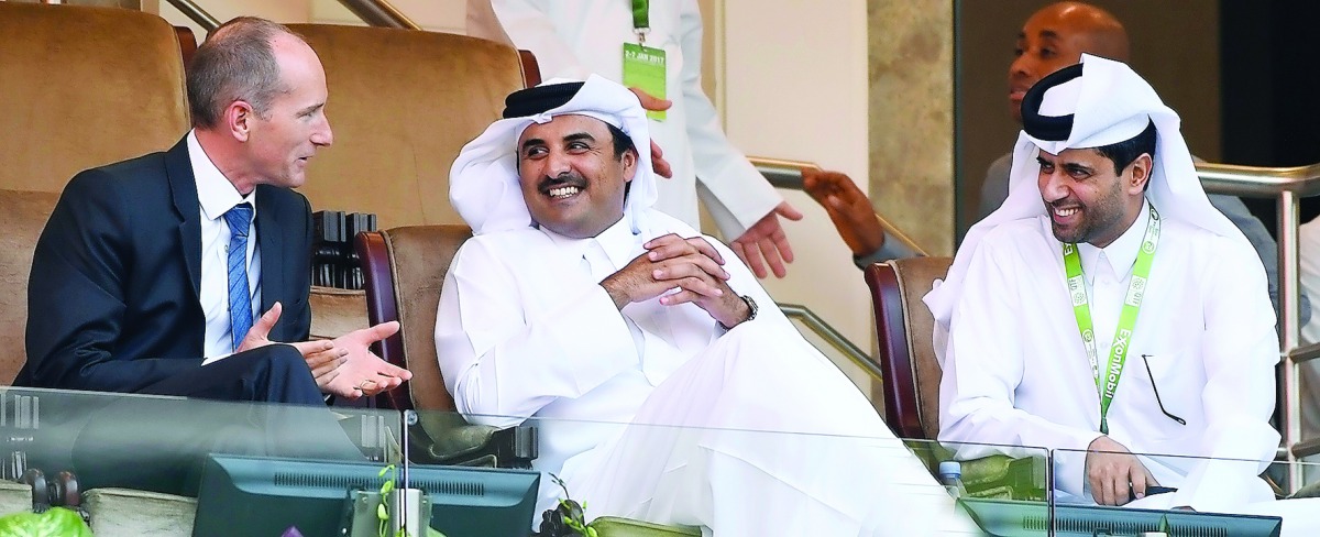 Emir H H Sheikh Tamim bin Hamad Al Thani watching the first round of Qatar ExxonMobil Open Men's Tennis at the Khalifa International Tennis and Squash Complex, yesterday. The Emir watched the match between Qatar's Mubarak Shannan and Russia's Karen Khacha