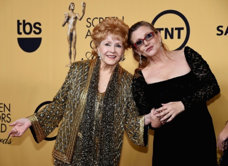 File photo of Debbie Reynolds and her daughter Carrie Fisher. AFP