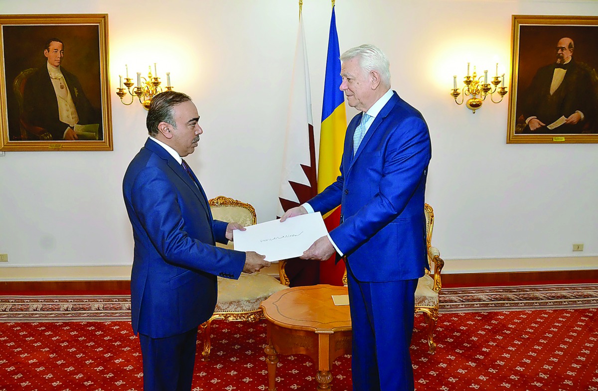 Minister of Foreign Affairs of the Republic of Romania Teodor Melescanu (right) receiving a copy of credentials of Abdullah bin Nasser Al Humaidi as Extraordinary and Plenipotentiary Ambassador of Qatar to Romania. Romania's Foreign Minister wished the Qa