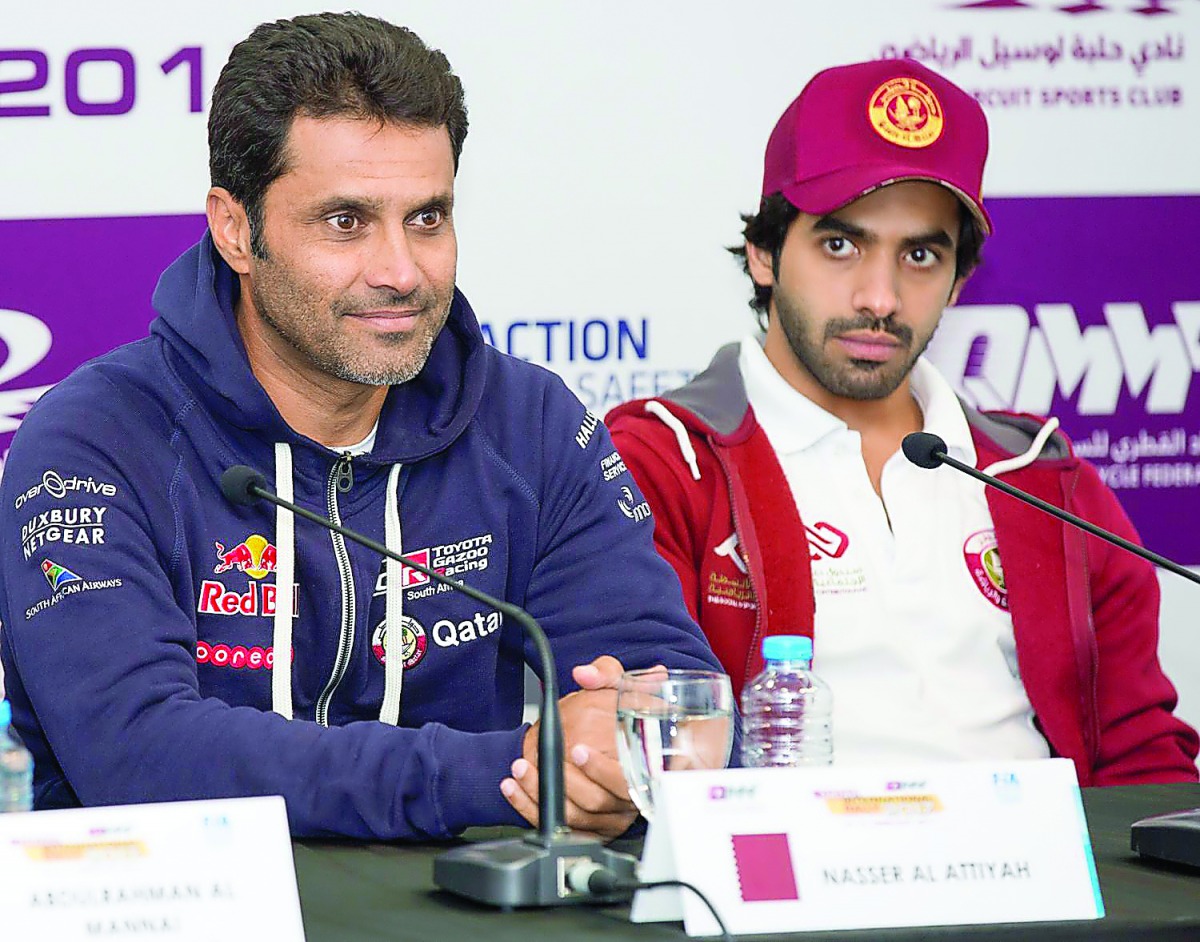 Nasser Saleh Al Attiyah ( left) and Khaled Al Suwaidi, both of Qatar, during the Qatar Rally pre-event press conference on Thursday. Al Attiyah overcame stiff resistance from Al Suwaidi to take the lead at the end of day one of the two-day event. 