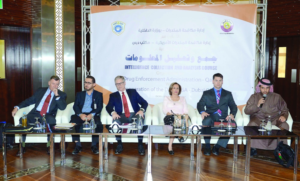Guests seated on the dais at the training session.