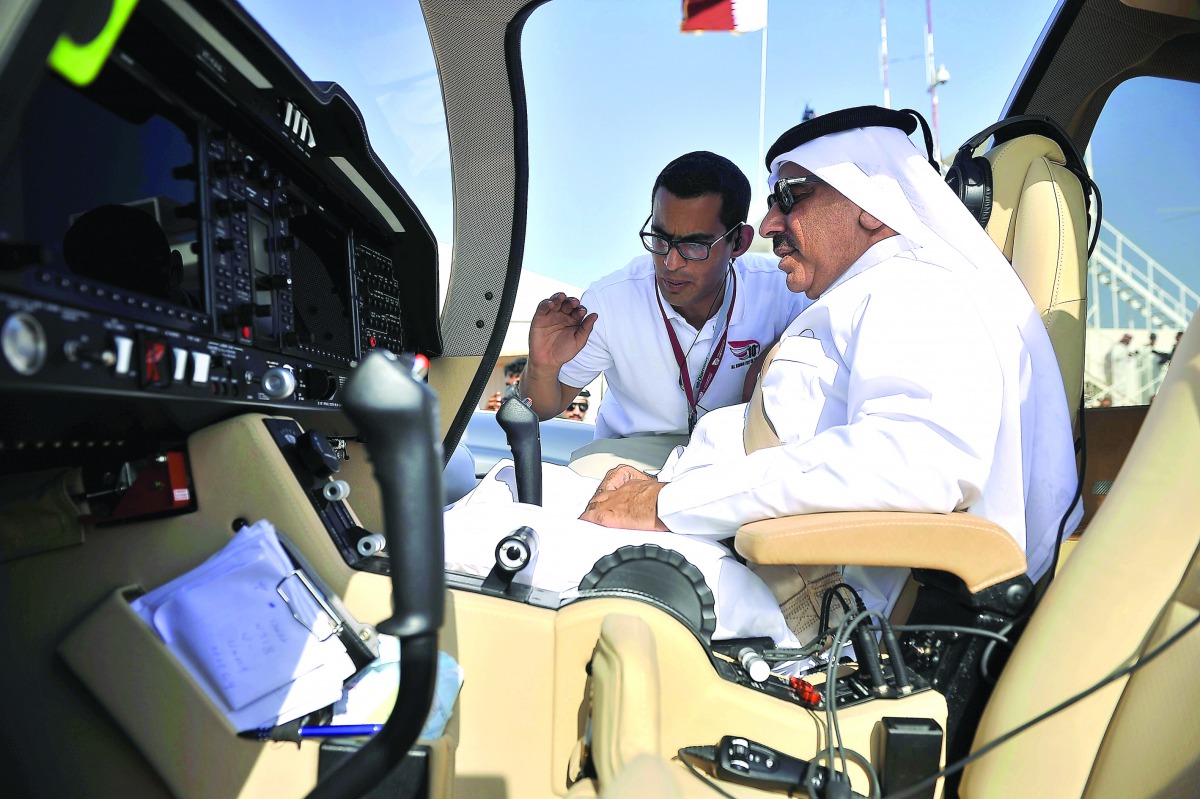 Minister of Transport and Communications H E Jassim bin Saif Al Sulaiti at the cockpit of an aircraft during the 10th Al Khor Fly-In Day 2017, at Al Khor airport yesterday. Pic: Baher Amin/ The Peninsula