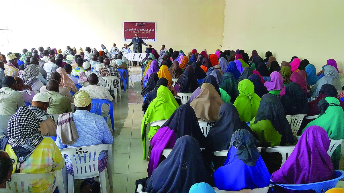People being informed about a QC project in Somalia.