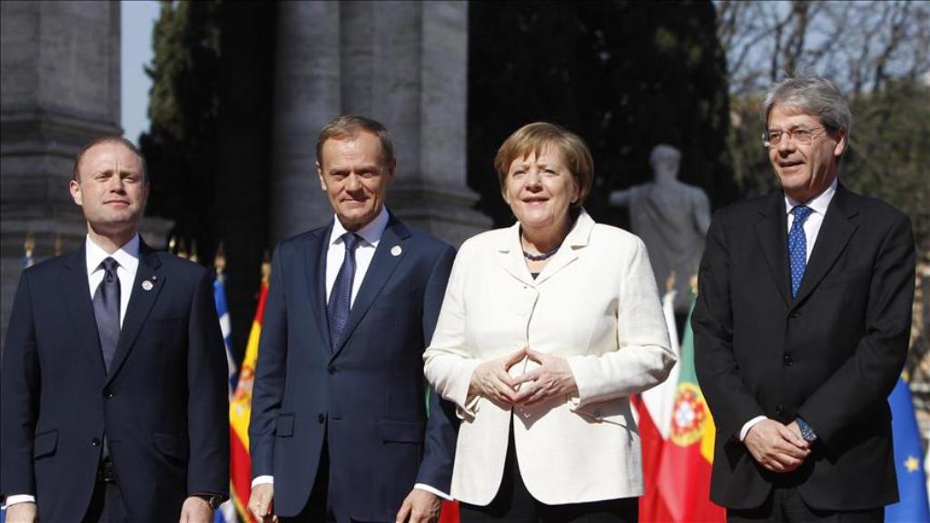 ROME, ITALY - MARCH 25 : German Chancellor Angela Merkel (2R) poses with Malta's Prime Minister and EU's rounding President Joseph Muscat (L), EU Council's President Donald Tusk (2L) and Italian Premier Paolo Gentiloni (R) as he arrives for a ceremony mar