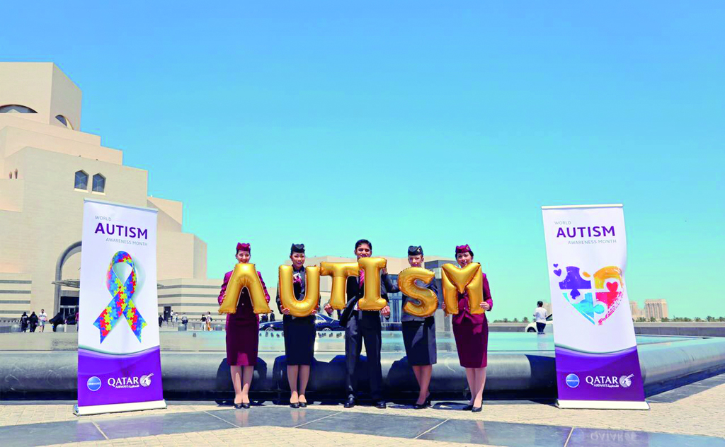 Qatar Airways cabin crew taking part in Autism awareness month.