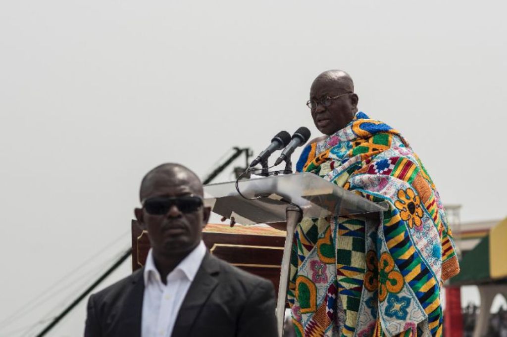 The winner of Ghana's presidential election, Nana Akufo-Addo, takes the oath of office during the swearing-in ceremony at Independence Square in Accra, on January 7, 2017 (AFP Photo/Cristina Aldehuela).