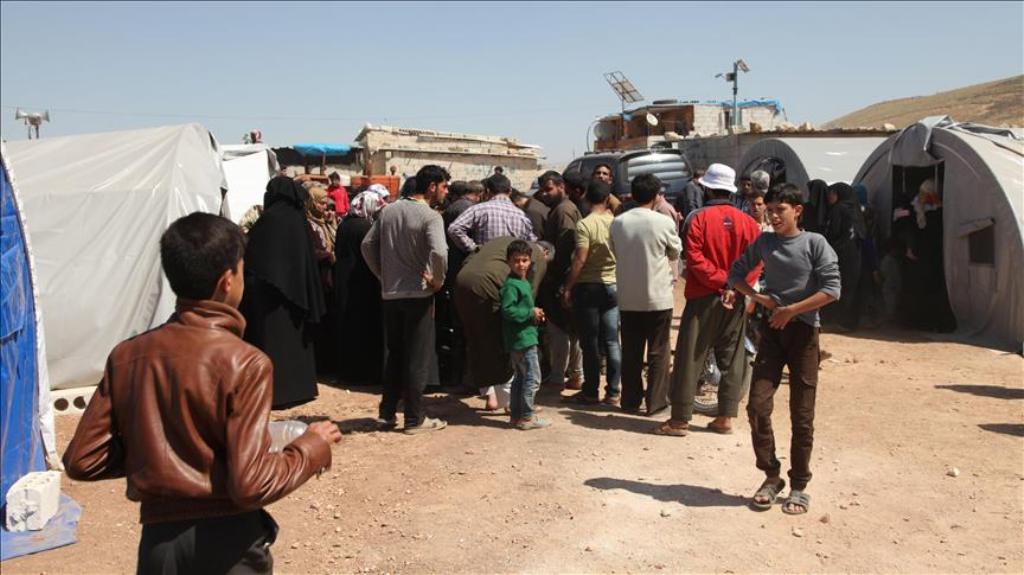 Chemical gas attack survivors are placed in a camp at Turkish border in Idlib, Syria on April 6, 2017. ( Abdüssamed Dagül - Anadolu Agency ).