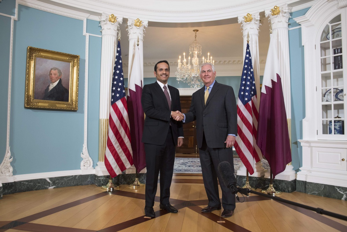 US Secretary of State Rex Tillerson and Qatari Foreign Minister Mohammed bin Abdulrahman al-Thani shake hands prior to a meeting at the State Department in Washington, DC, May 8, 2017. (AFP / SAUL LOEB)