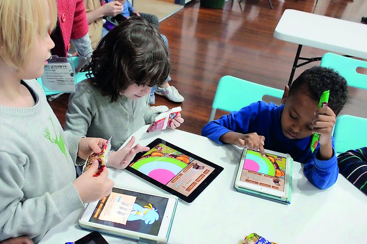 Students working with the WISE Accelerator project Joko’s World interactive learning applications.