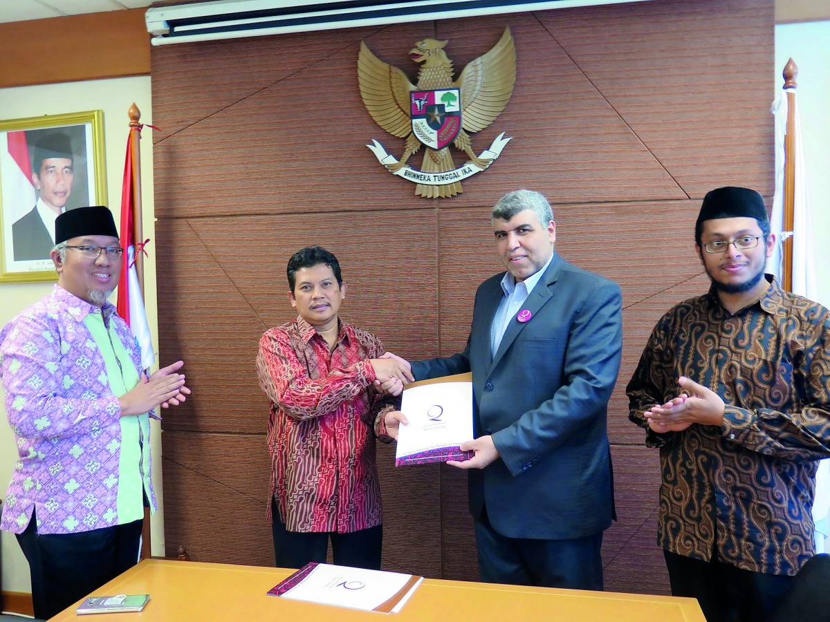Officials at the agreement signing event.
