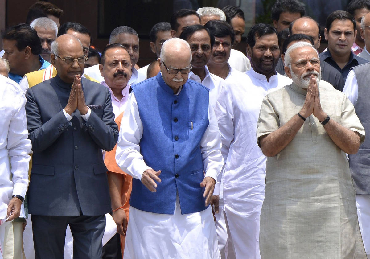  This file photo taken on June 23, 2017 shows Ram Nath Kovind (L), the National Democratic Alliance (NDA) governments's candidate for the upcoming presidential election, gesturing as he leaves an NDA meeting with Indian Prime Minister Narendra Modi (R) an
