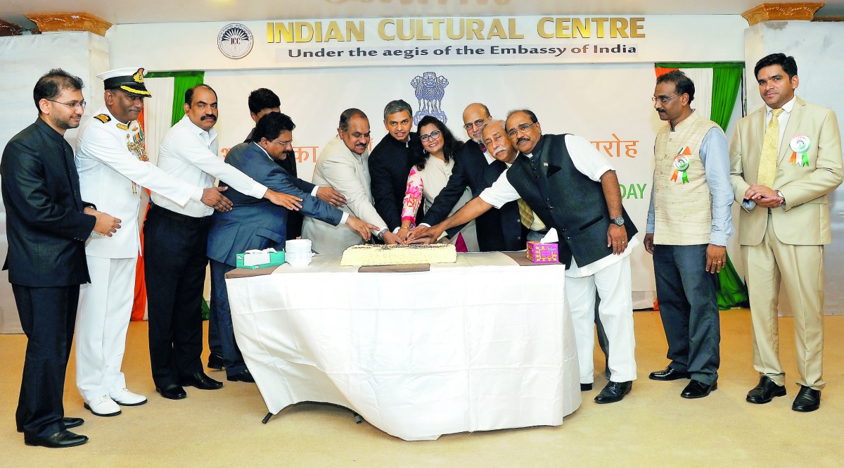 Ambassador P Kumaran (centre) along with other officials cutting a cake to mark the celebrations. Pic: Kammutty VP / The Peninsula
