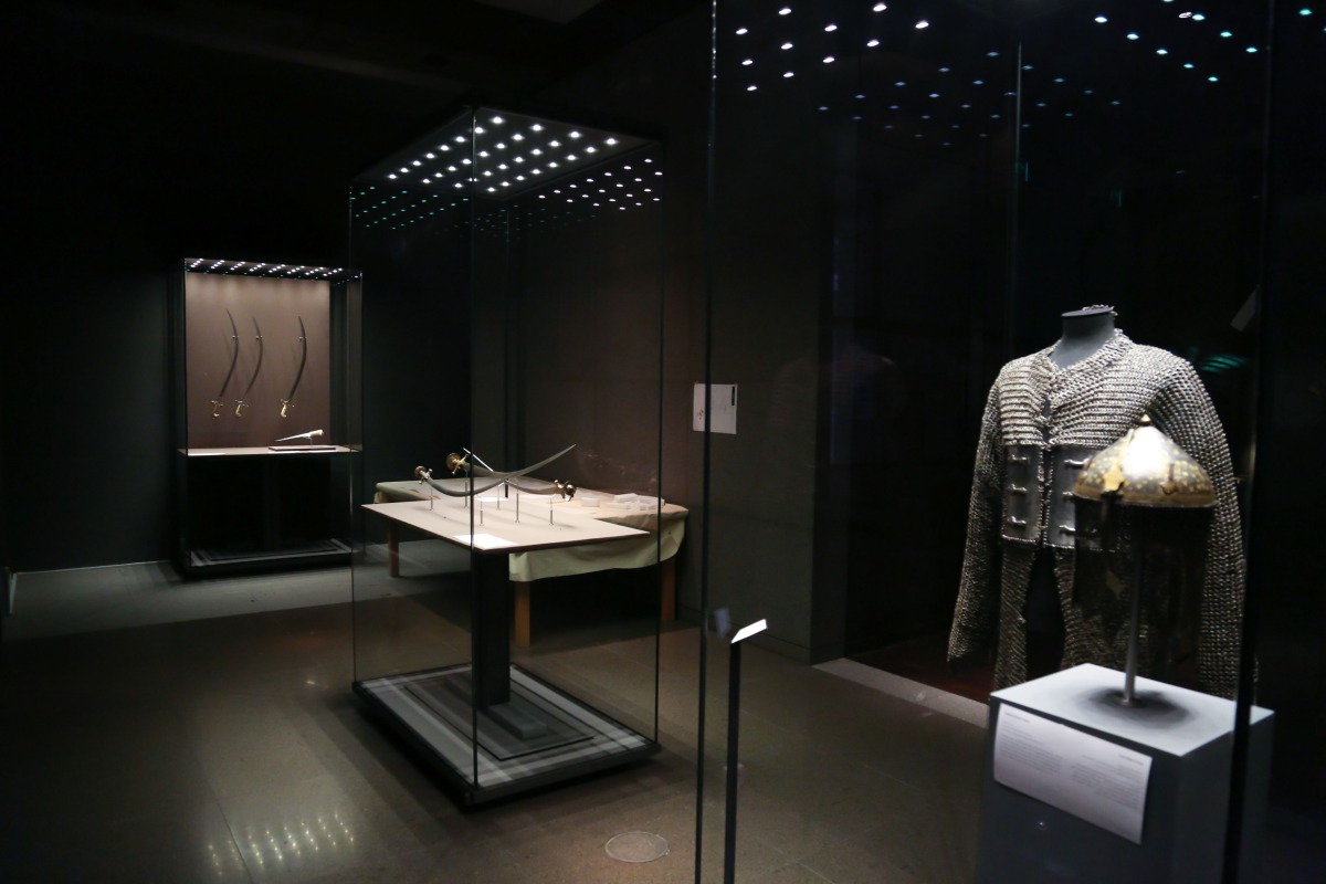 Objects being installed at the Powder and Damask: Islamic Arms and Armour from the Collection of Fadel Al Mansoori exhibition which opens on Sunday at the Museum of Islamic Art. 