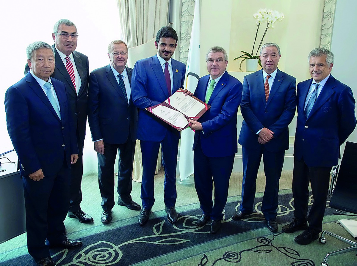 President of the Qatar Olympic Committee (QOC), H E Sheikh Joaan bin Hamad Al Thani making a donation to the Olympic Refugee Foundation, accepted by International Olympic Committee (IOC) President Thomas Bach during the launch of the Foundation in Lima, P