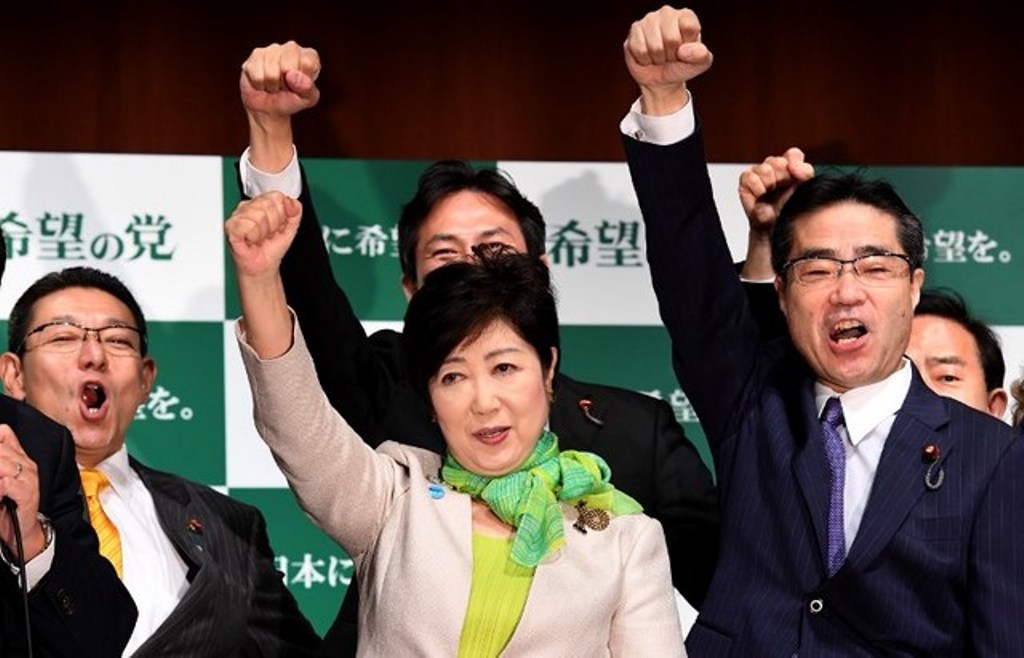 'PARTY OF HOPE' Tokyo Governor Yuriko Koike (C) poses with her party members during an inauguration press conference on her new political party, 'Party of Hope', in Tokyo on September 27, 2017. Toshifumi Kitamura/AFP.