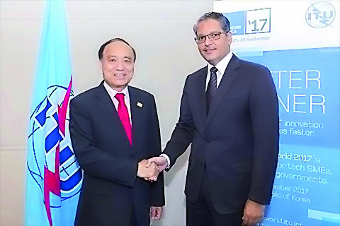 President of CRA Mohammed Ali Al Mannai (right) with Secretary-General of the ITU, Houlin Zhao.