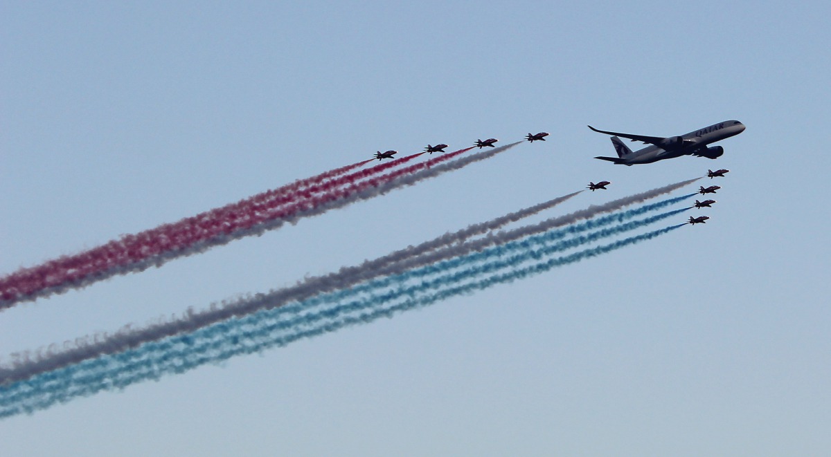 Qatar Airways Airbus A350 flying in formation with the British Royal Air Force’s (RAF) iconic Red Arrows